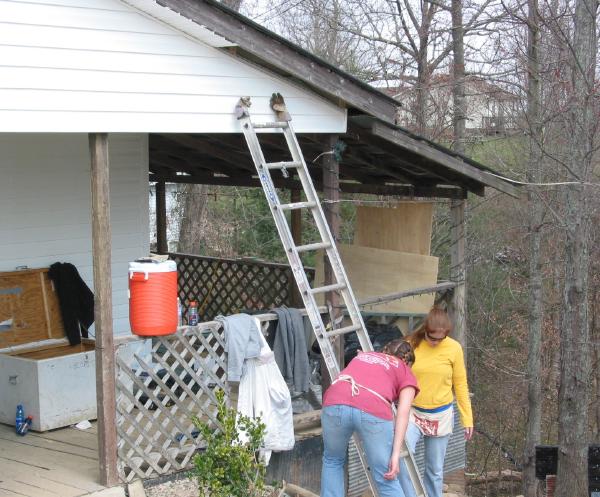 Corrie & Christine putting up soffit