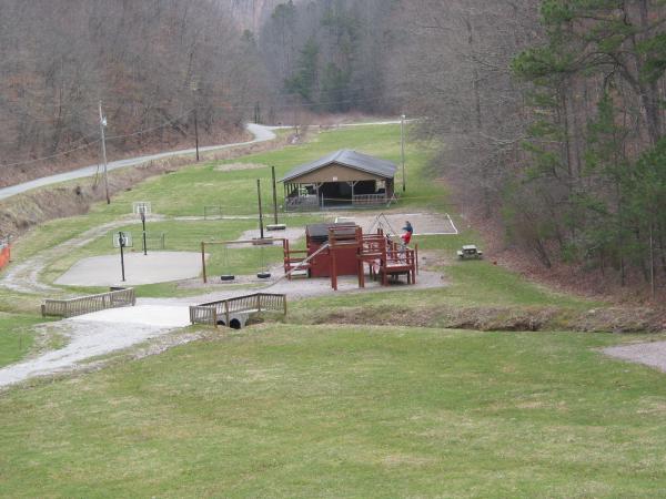 Playground and climbing wall near entrance road